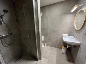 Kopalnica v nastanitvi Apartmány NONE