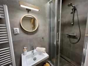 Kopalnica v nastanitvi Apartmány NONE