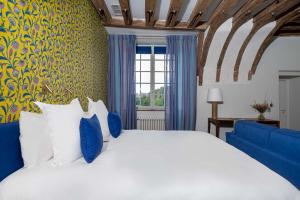 Posteľ alebo postele v izbe v ubytovaní La Borde en Sologne Château & Spa + 37 fotografií