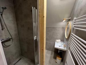 Kopalnica v nastanitvi Apartmány NONE