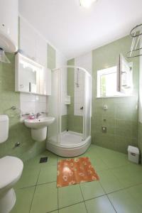 Kúpeľňa v ubytovaní Adriatic Apartment Neum