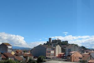 a view of a city with houses and buildings at Corazón de Lemos in Monforte de Lemos