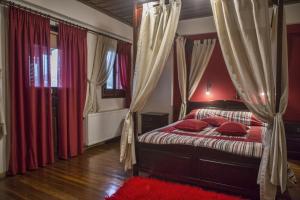 Letto o letti in una camera di T'Asprolithia
