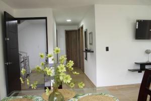 TV a/nebo společenská místnost v ubytování Lindo apartamento con estacionamiento Buga