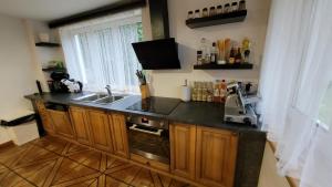Kuchyň nebo kuchyňský kout v ubytování Wellness Aqua House