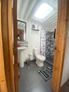 Vannituba majutusasutuses Glamping El Refugio