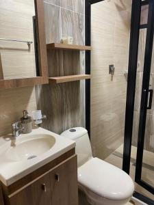 Koupelna v ubytování Lindo apartamento con estacionamiento Buga