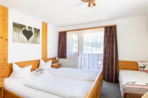 Postel nebo postele na pokoji v ubytování Haus Elisabeth