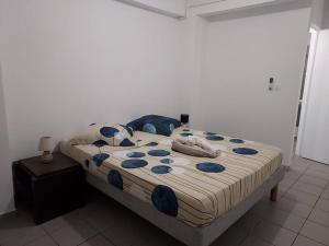 Ένα ή περισσότερα κρεβάτια σε δωμάτιο στο Appartement T2 le Vallon au Marin Martinique