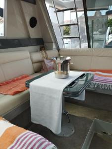 a table in the back of a boat at Ferretti 36 ' Bateau à Quai Vieux-Port Cannes Festival La Croisette in Cannes
