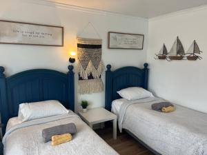 Postel nebo postele na pokoji v ubytování Cobmin Ridge Motel