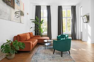 Część wypoczynkowa w obiekcie oompH Koszyki Luxurious Apartments