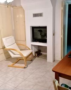 A television and/or entertainment centre at SOFIA'S HOUSE