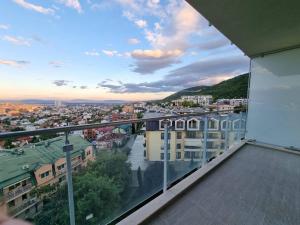 a view of a city from the balcony of a building at Venus in Skopje