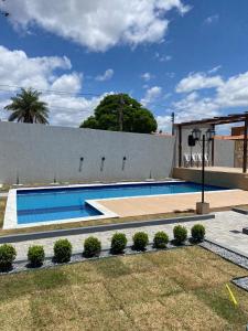 a swimming pool in the backyard of a house at Villa Suíça Ibiapaba in Tianguá