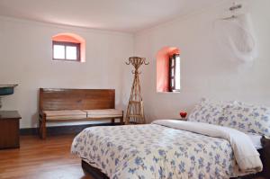 Rúm í herbergi á Cocina Mitho Chha BNB
