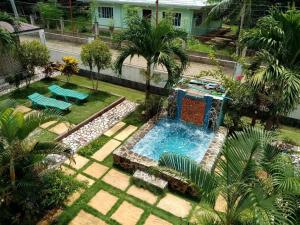 an overhead view of a swimming pool in a yard at PEDRO'S RESORT in Panglao Island