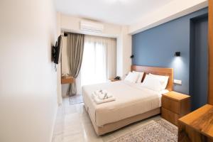 A bed or beds in a room at Patras Casale