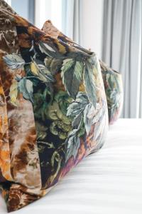 two pillows sitting on top of a table at The Langlands Hotel in Invercargill