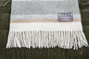 a close up of a white scarf with a sign at The Langlands Hotel in Invercargill