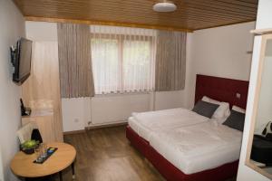 Postel nebo postele na pokoji v ubytování Haus Vilgrassa