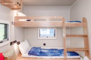 Voodi või voodid majutusasutuse Tai  Ping  Shan Inn toas