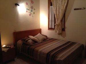 Posteľ alebo postele v izbe v ubytovaní Menelaos Apartments