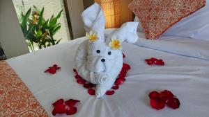 Kubu Garden Suites & Villas Nusa Dua客房内的一张或多张床位
