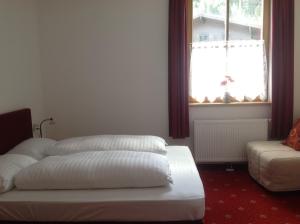 Łóżko lub łóżka w pokoju w obiekcie Kitz Residenz Top 6