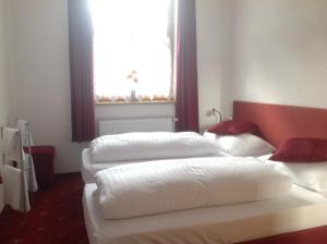 Łóżko lub łóżka w pokoju w obiekcie Kitz Residenz Top 6