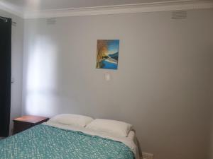 Postel nebo postele na pokoji v ubytování Homestay near Dandenong Plaza