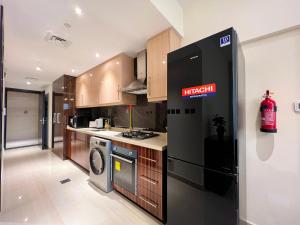 Kuchyň nebo kuchyňský kout v ubytování Luton Vacation Homes - Elite Residence Downtown, Dubai
