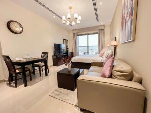 Posezení v ubytování Luton Vacation Homes - Elite Residence Downtown, Dubai