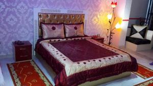 Hotel Buza 객실 침대
