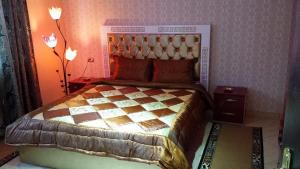 Hotel Buza 객실 침대