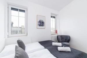 Posteľ alebo postele v izbe v ubytovaní Radziwiłłowska Apartment Cracow Planty by Noclegi Renters