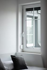 Posteľ alebo postele v izbe v ubytovaní Radziwiłłowska Apartment Cracow Planty by Noclegi Renters