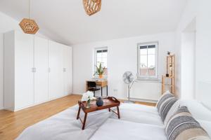 Posteľ alebo postele v izbe v ubytovaní Radziwiłłowska Apartment Cracow Planty by Noclegi Renters