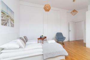 Posteľ alebo postele v izbe v ubytovaní Radziwiłłowska Apartment Cracow Planty by Noclegi Renters