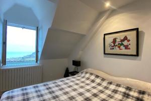 Posteľ alebo postele v izbe v ubytovaní LE GRAND LARGE Superbe appartement vue sur mer