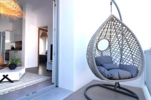Posedenie v ubytovaní The Nine Graces - Agios Prokopios Beach Apartments -Option with terrace and jacuzzi