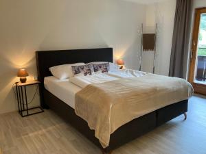 Posteľ alebo postele v izbe v ubytovaní Haus Standlgut Rauris -- incl Sommercard