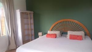 Postel nebo postele na pokoji v ubytování Villa mimosa