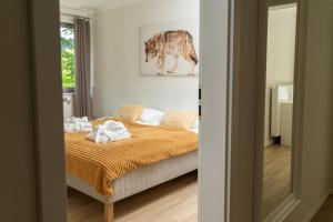 Krevet ili kreveti u jedinici u objektu ApartView Premium by Rent like home