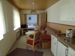 Kuchyň nebo kuchyňský kout v ubytování Pension Haus Ruth - Gartenhaus