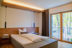 Postel nebo postele na pokoji v ubytování Kolping-Hotel