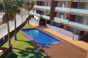 Bazén v ubytování Apartamento Residencial Deltamar nebo v jeho okolí