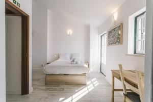 En eller flere senger på et rom på Best Houses 65 - Sea & Surf House Consolação