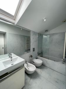 a bathroom with a sink and a toilet and a shower at BF 677 in Vila do Conde +18 photos