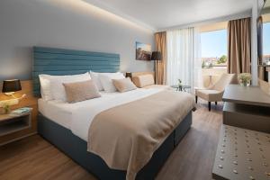Krevet ili kreveti u jedinici u okviru objekta Valamar Meteor Hotel